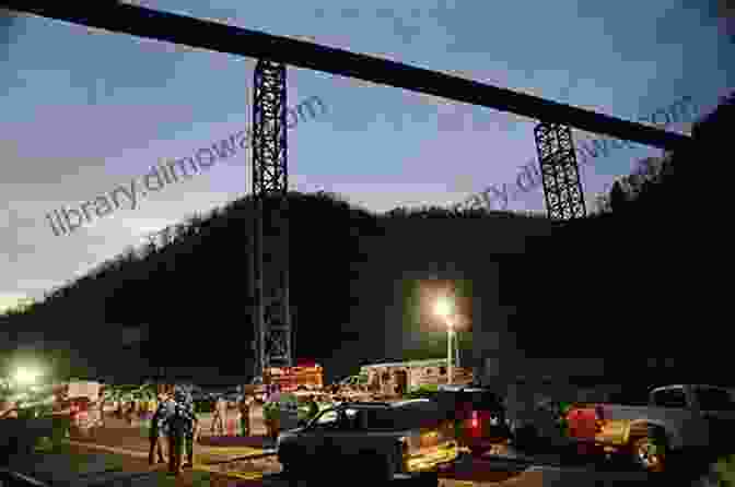 A Panoramic View Of The West Virginia Coal Mine Disaster Site, Showing The Collapsed Mine Entrance And Rescue Crews Working Amidst The Devastation. Tragedy At Pike River Mine: 2024 Edition: How And Why 29 Men Died