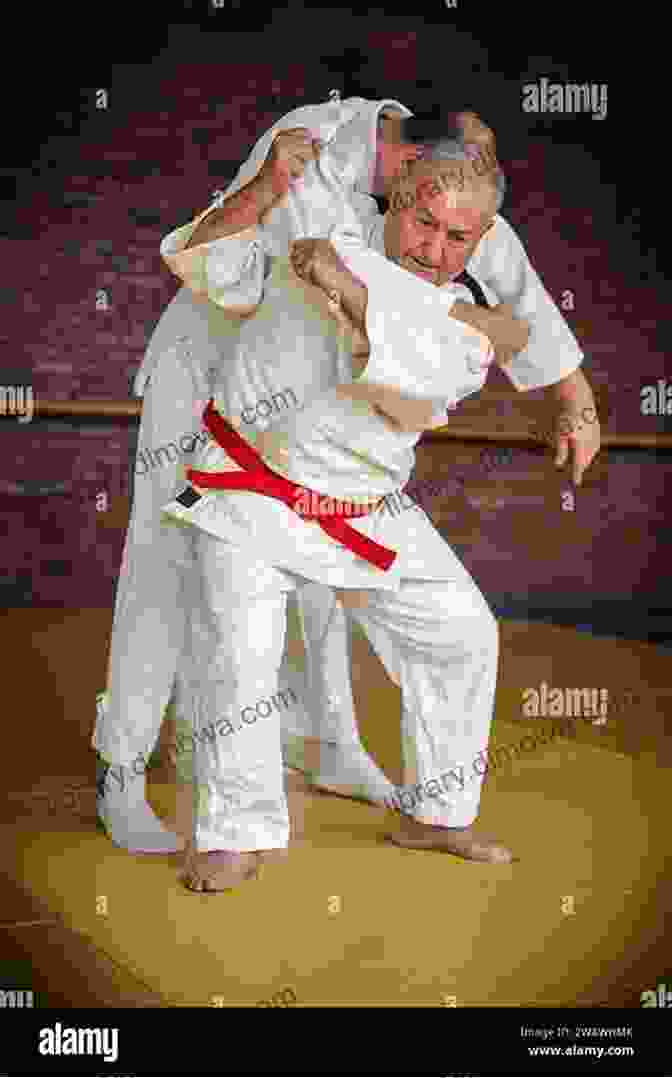 Judo Practitioners Demonstrating A Throw Techniques Of Judo (Tuttle Martial Arts)